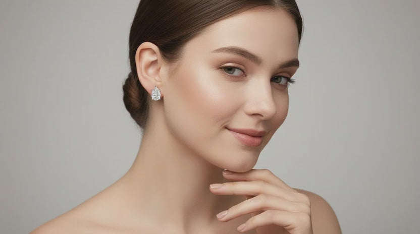 Load video: 2.64 Ct Pear Shape Solitaire Diamond Stud Earrings | 14K Yellow Gold