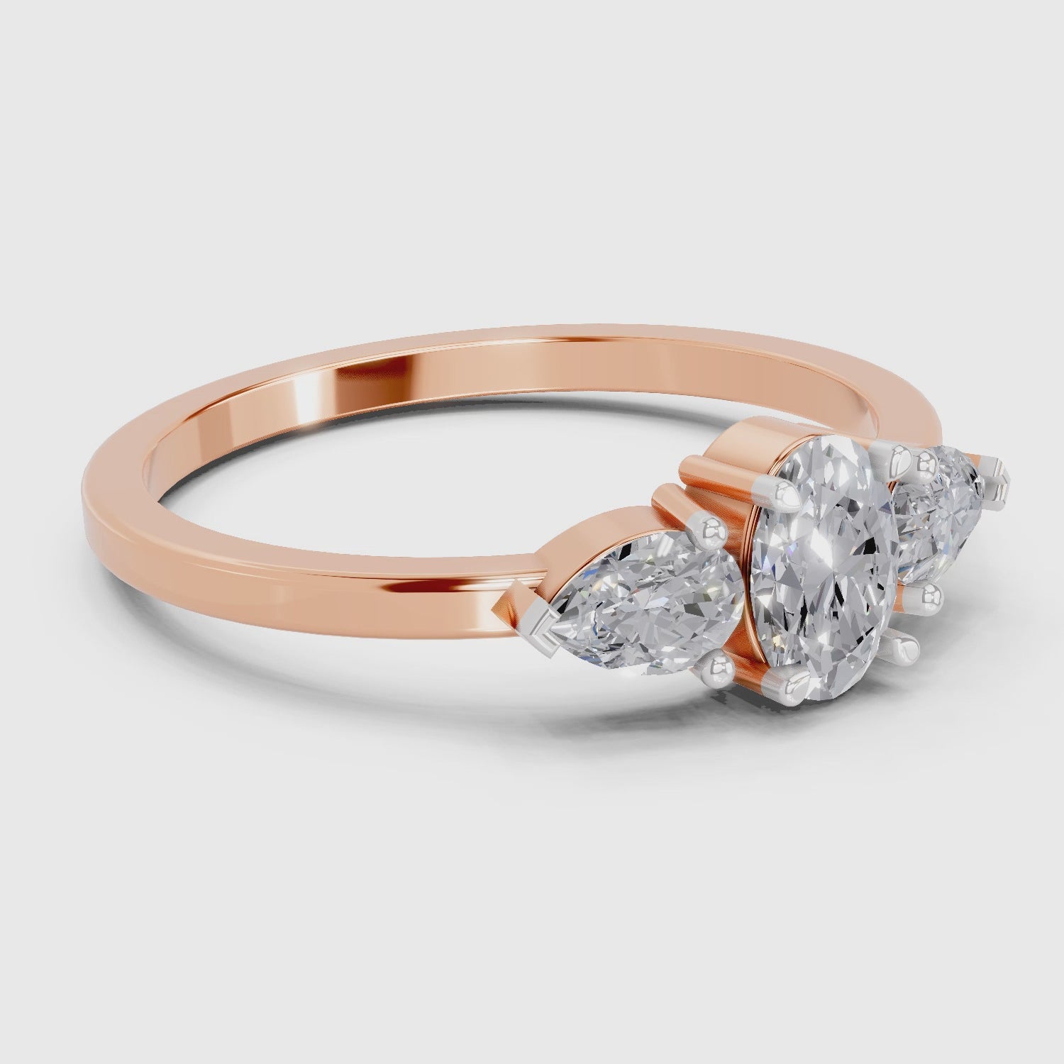 0.60 Carat Three-Stone Oval & Pear Diamond Engagement Ring | 14K Rose Gold